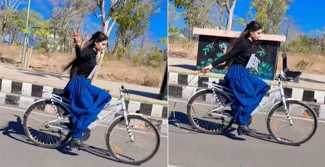 সাইকেল চালাতে চালাতে তরুণীর ‘দড়িলাফ’, অবাক নেট দুনিয়া সাইকেল চালাতে চালাতে তরুণীর ‘দড়িলাফ’, অবাক নেট দুনিয়া