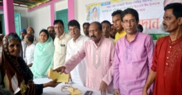 ধুনটে দুস্থদের সহায়তা দিলেন আ.লীগ নেতা মজনুু